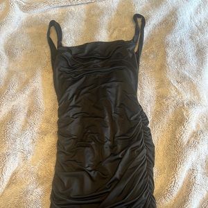 Backless ruched bottom form fitting Little black dress